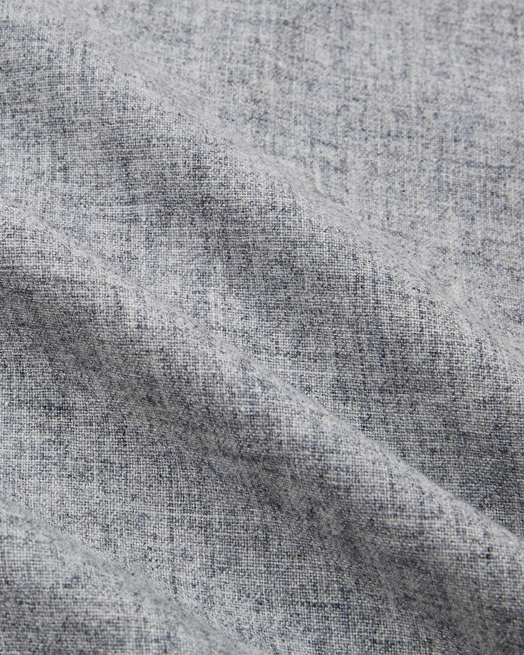 Close-up of the Aloha 100th Infantry 1942 Authentic Wool Road Baseball Jersey by Ebbets Field, featuring soft light gray wool with a woven texture and gentle folds, echoing the original team's lightweight, breathable style.