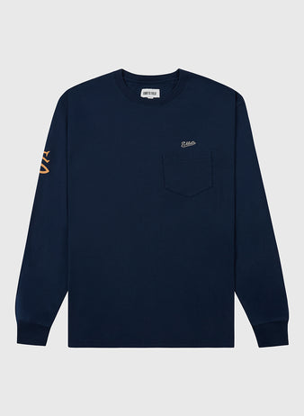 The Ebbets Field San Francisco Seals (PCL) Long Sleeve Graphic Tee features navy blue fabric, a chest pocket with small embroidery, and bold orange sleeve graphics—ideal for Pacific Coast League fans. Shown on a light gray background.