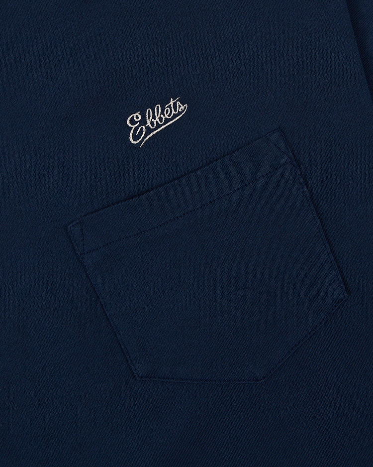 Close-up of the San Francisco Seals (PCL) Long Sleeve Graphic Tee by Ebbets Field. Navy blue with a chest pocket and 