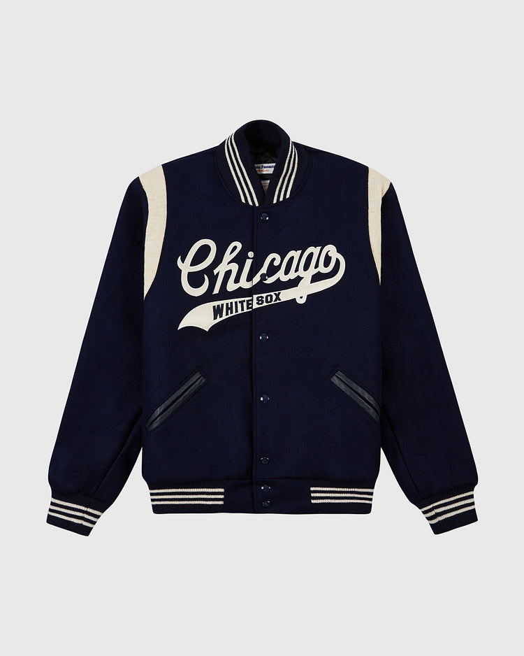 EFF's Chicago White Sox 1967 Authentic All Wool Varsity Jacket features navy blue wool with cream stripes on the cuffs, collar, and hem, plus large cream 