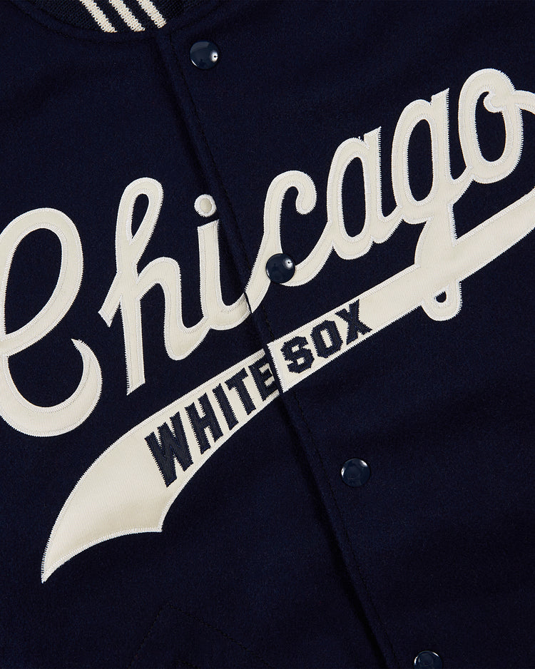 Close-up of the EFF Chicago White Sox 1967 Authentic All Wool Varsity Jacket, featuring navy varsity style with “Chicago” script and “White Sox” in block letters on a cream banner across the front.