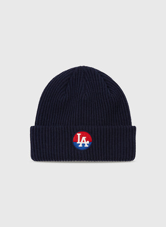 The Ebbets Field Los Angeles Angels (PCL) Patch Logo Ribbed Beanie features a navy blue ribbed knit, folded brim, and embroidered LA patch, perfect for Pacific Coast League and LA Angels fans.