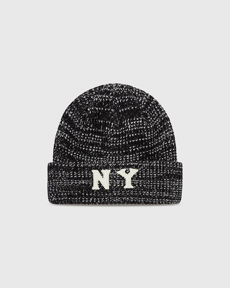 The Ebbets Field New York Black Yankees Felt Logo Ribbed Beanie is a black and white marled knit hat with a folded brim and bold white NY letters, honoring the legacy of the Negro National League team.