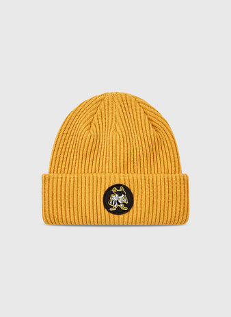 The Ebbets Field Salt Lake Bees Patch Logo Ribbed Beanie in mustard yellow features a folded brim and a circular black patch with an embroidered cartoon bee, celebrating the Salt Lake City Bees of the Pacific Coast League.