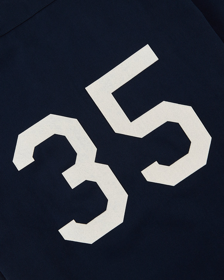 A bold white number 35 stands out on dark navy blue cotton twill, inspired by an Ebbets Field Brooklyn Eagles Negro Leagues jersey—Brooklyn Eagles Cotton Twill Baseball Jersey by Ebbets Field.