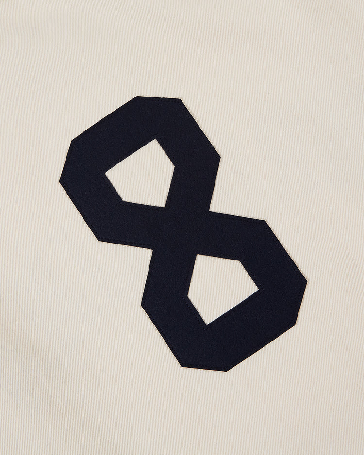 A large black number 8 stands out on a cream ribbed cotton twill background, echoing a vintage style in the Hiroshima Carp Cotton Twill Baseball Jersey by Ebbets Field.