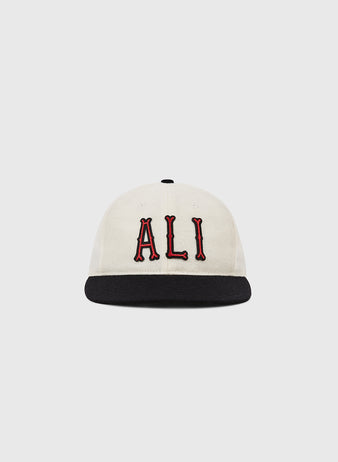 The Ebbets Field Muhammad Ali Vintage Inspired Wool Ballcap is white with a black brim and features 