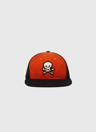 The EFF Sioux City Ghosts 1935 Authentic Wool Softbrim Ballcap features an orange front panel, black sides and brim, and a white skull and crossbones emblem.