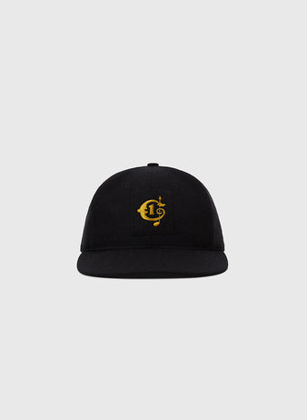 The Ebbets Field Tokyo Giants 1951 Authentic Wool Ballcap is black with a gold embroidered C and dollar sign logo, inspired by the original cap, shown on a plain light grey background.