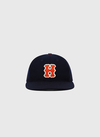 The Ebbets Field Hiroshima Carp 1958 Authentic Wool Ballcap is a navy cap with a flat brim and bold red-and-white 