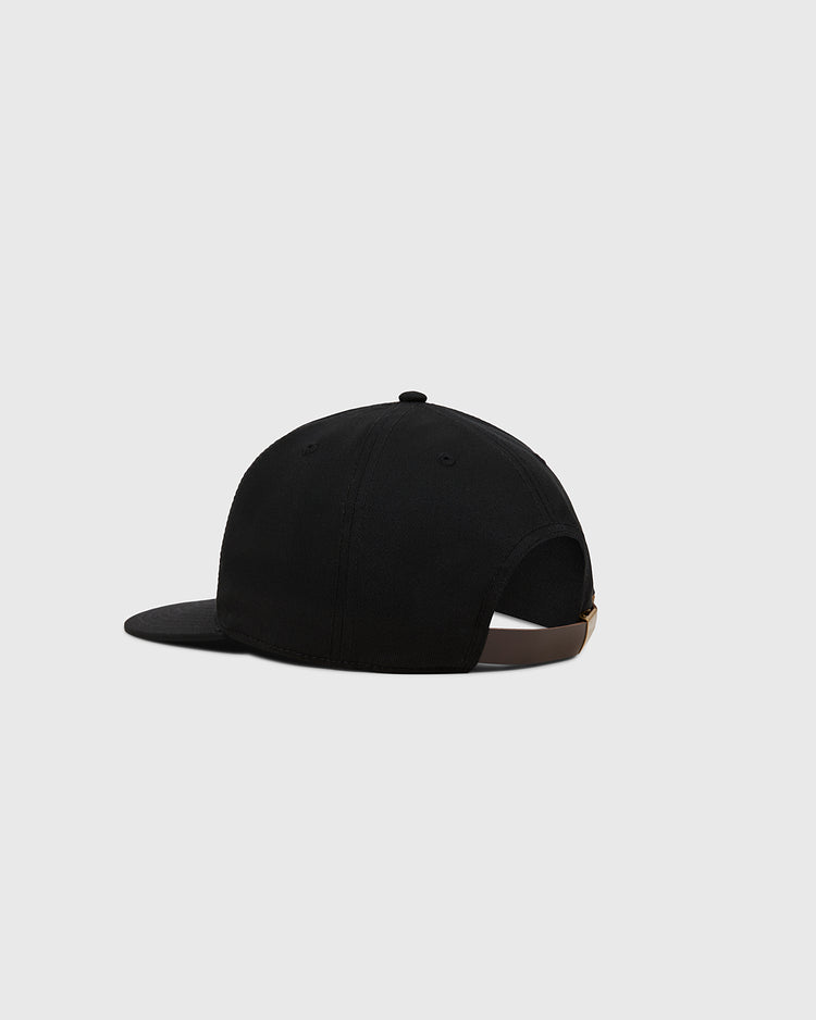 The Ebbets Field New York Cubans Cotton Twill Ballcap is shown from the back, featuring a brown adjustable strap and gold buckle on a plain light gray background, celebrating its Negro League roots.