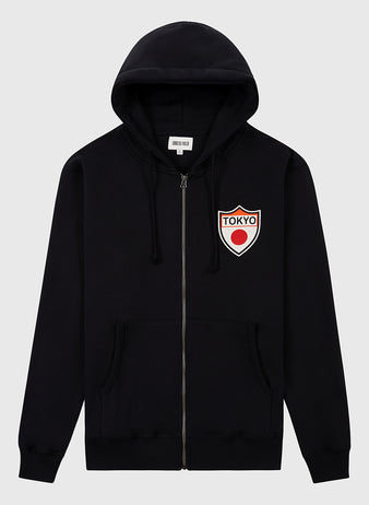 The Ebbets Field Tokyo Giants Heavyweight Cotton Terry Full-Zip Hoodie features front pockets, a drawstring hood, and a white left-chest patch with a red dot and bold TOKYO lettering for a retro vibe.