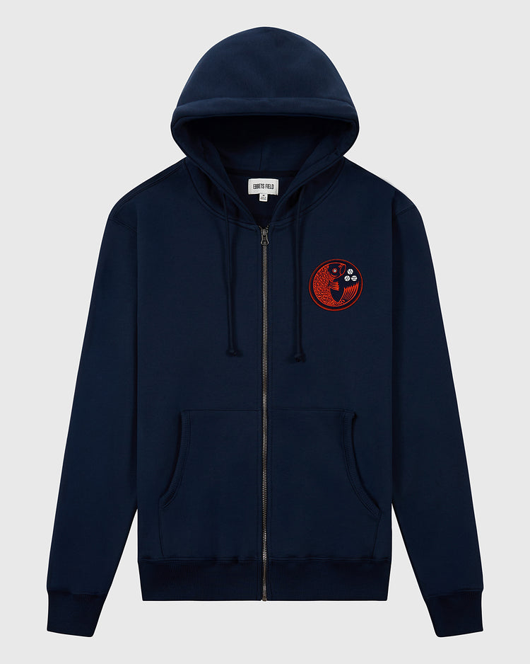 The Ebbets Field Hiroshima Carp Heavyweight Cotton Terry Full-Zip Hoodie is a navy vintage-style hoodie with front pockets and a hood, featuring a red and black embroidered yin-yang patch with abstract elements on the left chest.