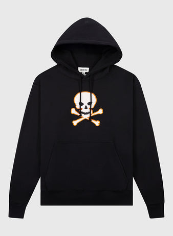 The Ebbets Field Sioux City Ghosts Double Felt Heavyweight Cotton Terry Pullover Hoodie is black with a white skull and crossbones graphic outlined in orange on the chest and a front kangaroo pocket, shown against a light gray background.