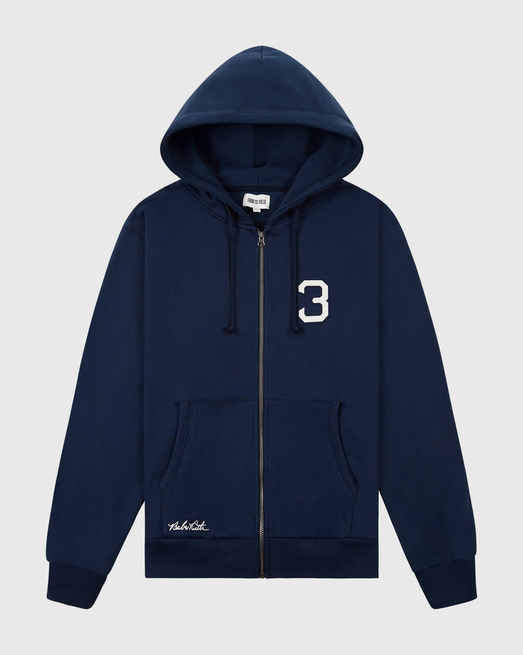 The Ebbets Field Babe Ruth Heavyweight Cotton Terry Full-Zip Hoodie features navy blue fabric, a drawstring hood, front pockets, a white number 3 on the left chest, and small white text near the left pocket.