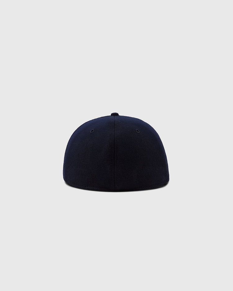 Back view of the Ebbets Field Aloha 100th Infantry 1942 Authentic Ballcap Navy, a fitted vintage cap inspired by Japanese-American history, shown against a light gray background.