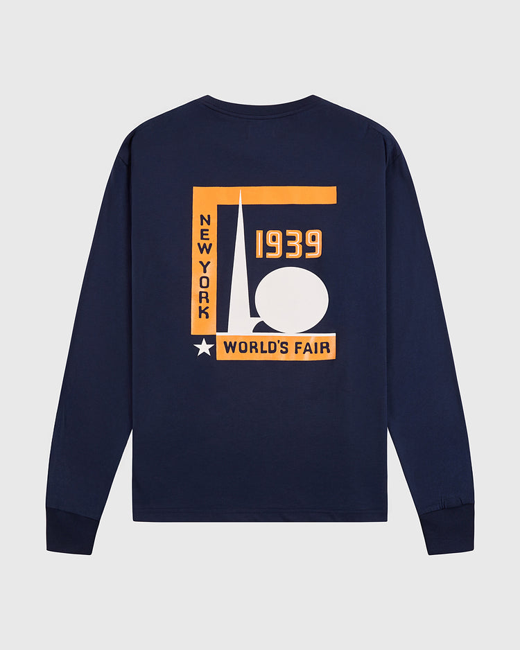 The Ebbets Field New York 1939 World's Fair Long Sleeve Graphic Tee features a bold orange and white graphic with geometric shapes and a star on the back, honoring the legendary event.