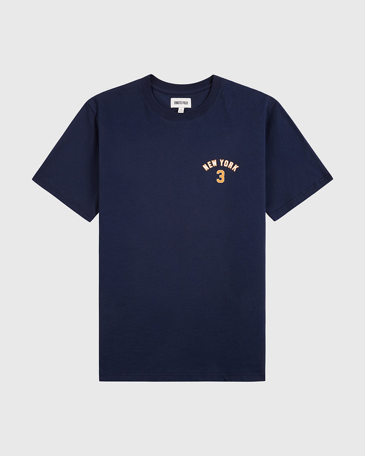 The Ebbets Field New York 1939 World’s Fair Short Sleeve Graphic Tee features a navy blue color with yellow NEW YORK and the number 3 on the chest, inspired by a Babe Ruth t-shirt. Displayed on a plain white background.