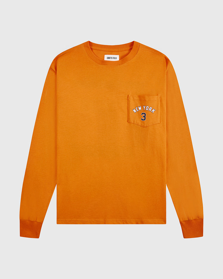 The Ebbets Field New York 1939 World's Fair Long Sleeve Graphic Tee features a chest pocket with NEW YORK 3 embroidered in white and blue, ribbed cuffs, and a crew neck—blending classic Yankees style with World’s Fair inspiration.