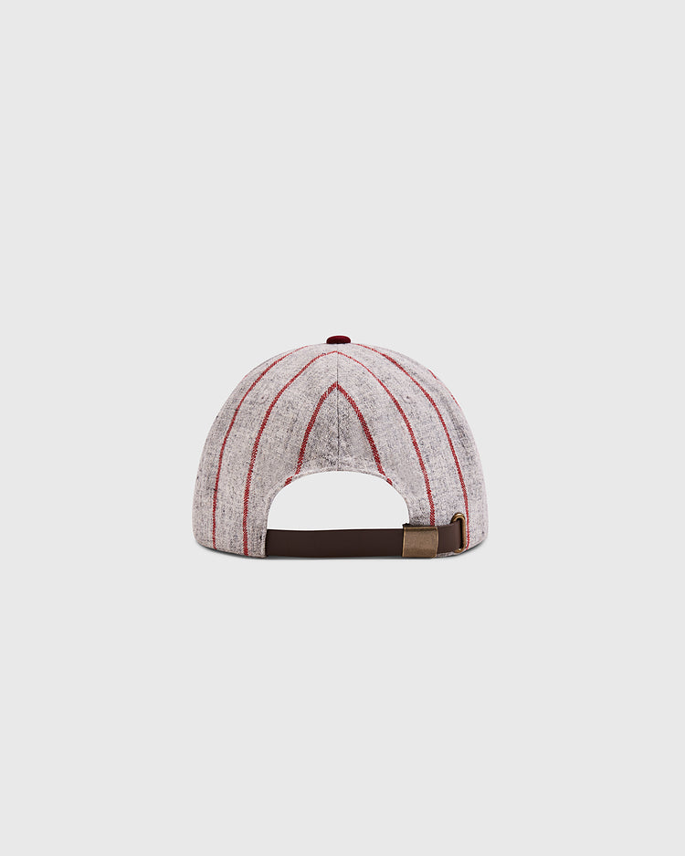 The Ebbets Field Mystery Caps of Mexico – Heroico Colegio Militar Authentic Wool Ballcap, shown from the back, features grey wool, red stripes, a brown adjustable strap with a brass buckle—a must-have for Mexican baseball history fans.