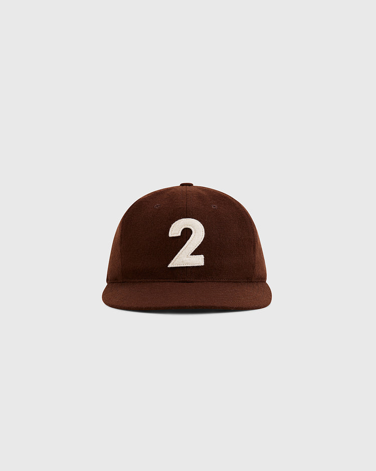 The Ebbets Field Mystery Caps of Mexico – Transito 1930 Authentic Wool Ballcap features a classic brown design with a white number 2 on the front, set against a light gray background—a unique collector’s piece for Mexican baseball fans.
