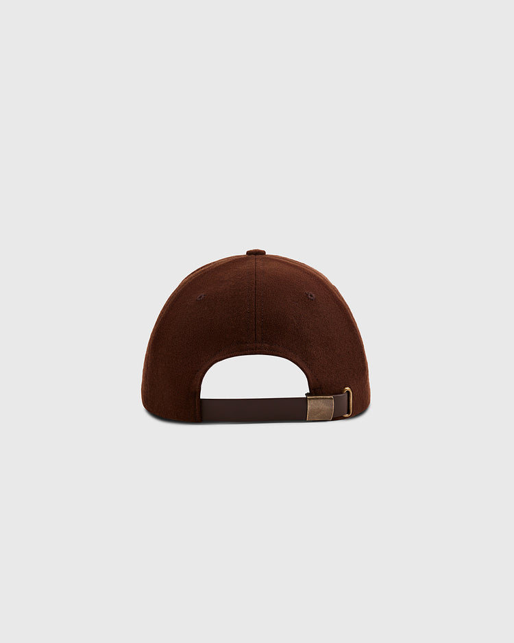The Ebbets Field Mystery Caps of Mexico – Transito 1930 Authentic Wool Ballcap, shown from the back with a curved brim and adjustable metal clasp strap, sits against a gray background—a must-have for collectors of Mexican baseball history.