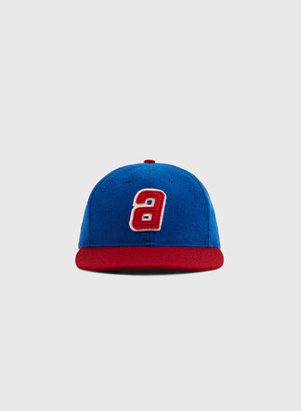 The Ebbets Field Sankei Atoms 1966 Vintage Inspired Wool Ballcap features a blue body, red brim, and white and red number 9 on the front—ideal for Astro Boy fans. Shown against a plain light gray background.