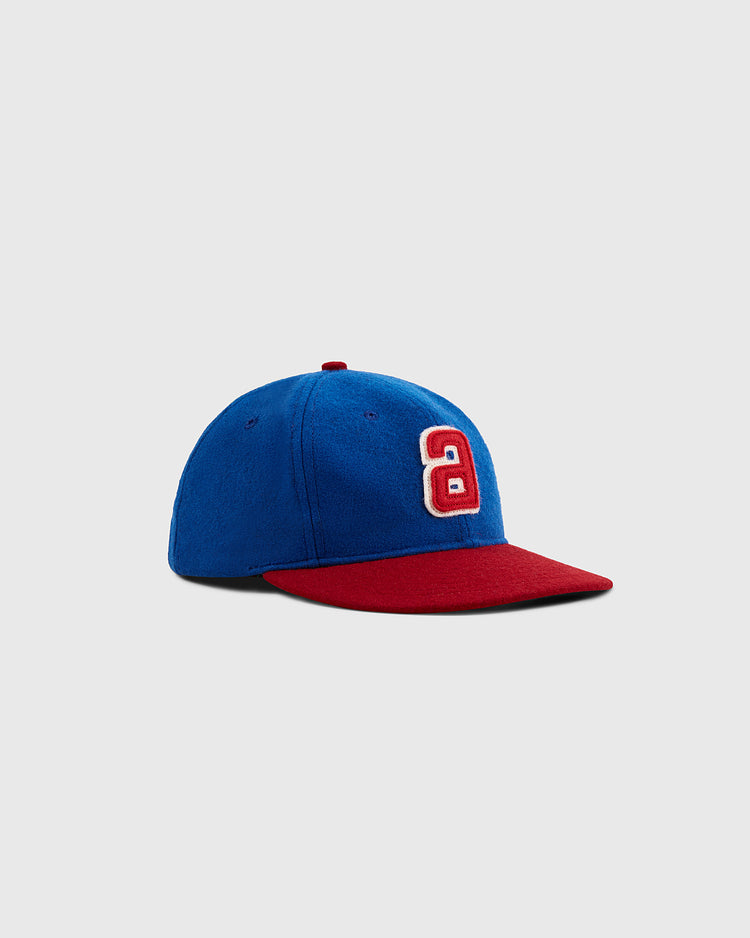 The Ebbets Field Sankei Atoms 1966 Vintage Inspired Wool Ballcap features blue wool, a red brim, and a red 