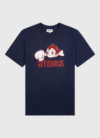 The Ebbets Field Sankei Atoms Short Sleeve Graphic Tee features a cartoon character with large eyes and a raised fist above bold red 