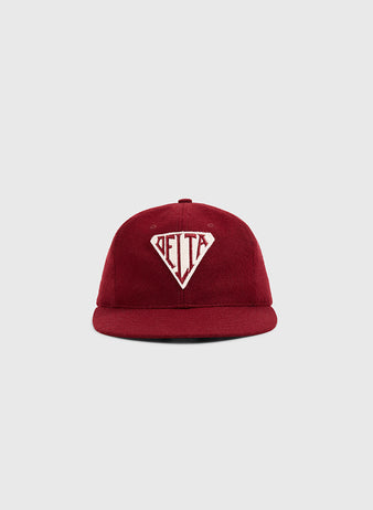 The Ebbets Field Mystery Caps of Mexico – Delta Authentic Wool Ballcap is a maroon vintage team cap with a flat brim and a white DELTA diamond patch, reflecting Mexican baseball history, shown on a plain gray background.