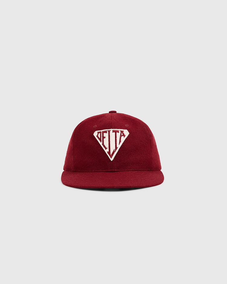 The Ebbets Field Mystery Caps of Mexico – Delta Authentic Wool Ballcap is a maroon vintage team cap with a flat brim and a white DELTA diamond patch, reflecting Mexican baseball history, shown on a plain gray background.