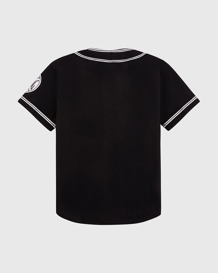 The Ebbets Field Babe Ruth Bustin' Babes Authentic Wool Baseball Jersey, shown from the back, features white trim and a circular Bustin’ Babes patch on the left sleeve, inspired by Babe Ruth’s iconic style.