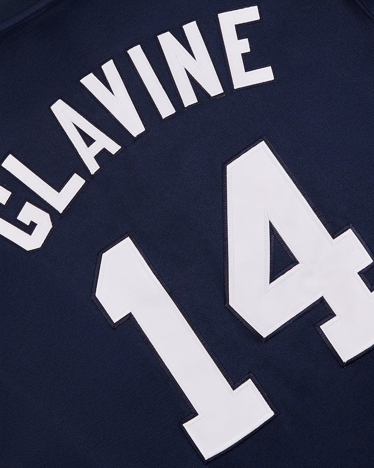 Close-up of a navy blue Ebbets Field Tom Glavine Richmond Braves V-Neck Jersey, with 
