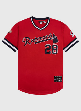 The Ebbets Field John Smoltz Richmond Braves V-Neck Jersey features red fabric, black and white striped sleeves and collar, the number 28, Richmond with an axe graphic, classic patches, and vintage minor league style.