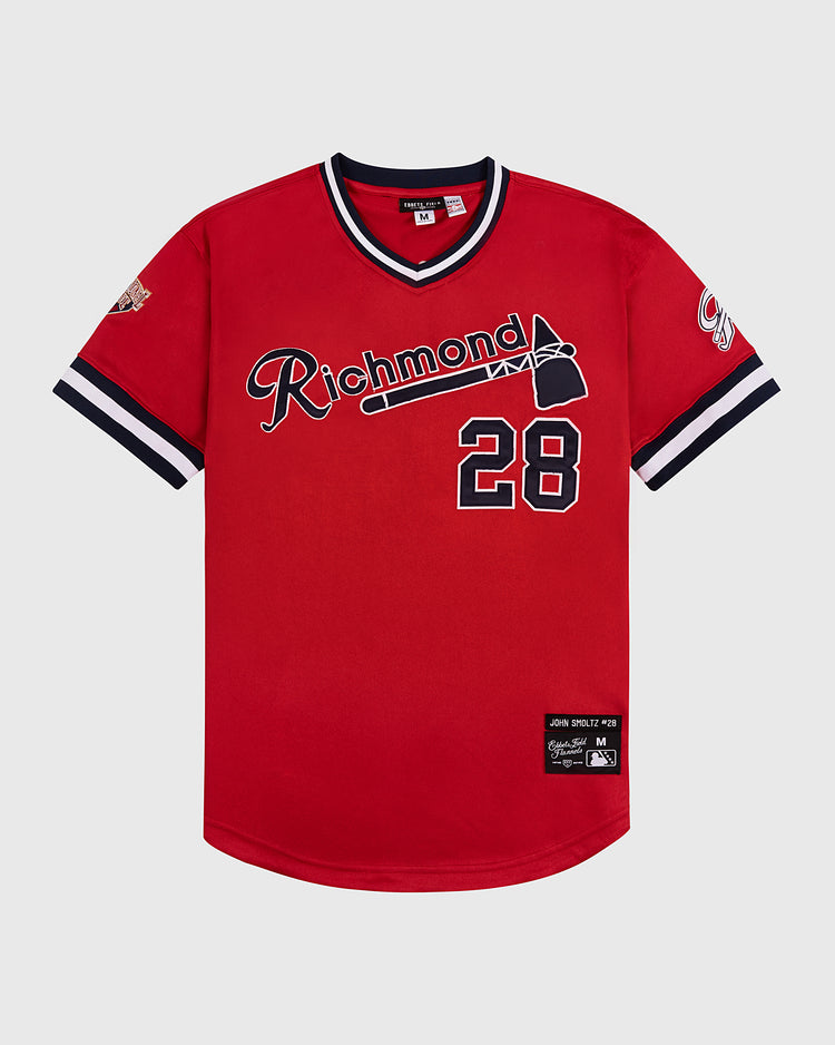 The Ebbets Field John Smoltz Richmond Braves V-Neck Jersey features red fabric, black and white striped sleeves and collar, the number 28, Richmond with an axe graphic, classic patches, and vintage minor league style.