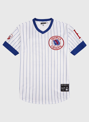 The Ebbets Field Greg Maddux Peoria Chiefs V-Neck Jersey is a white minor league jersey with blue pinstripes, blue cuffs and collar, a red Chiefs chest logo, and a red 