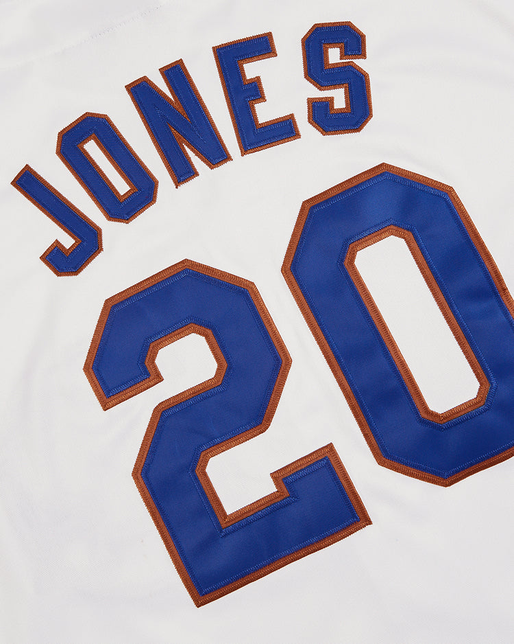 The Ebbets Field Chipper Jones Durham Bulls Button Up Jersey features JONES and number 20 in bold blue and orange—a must-have addition for any fan or memorabilia collection.