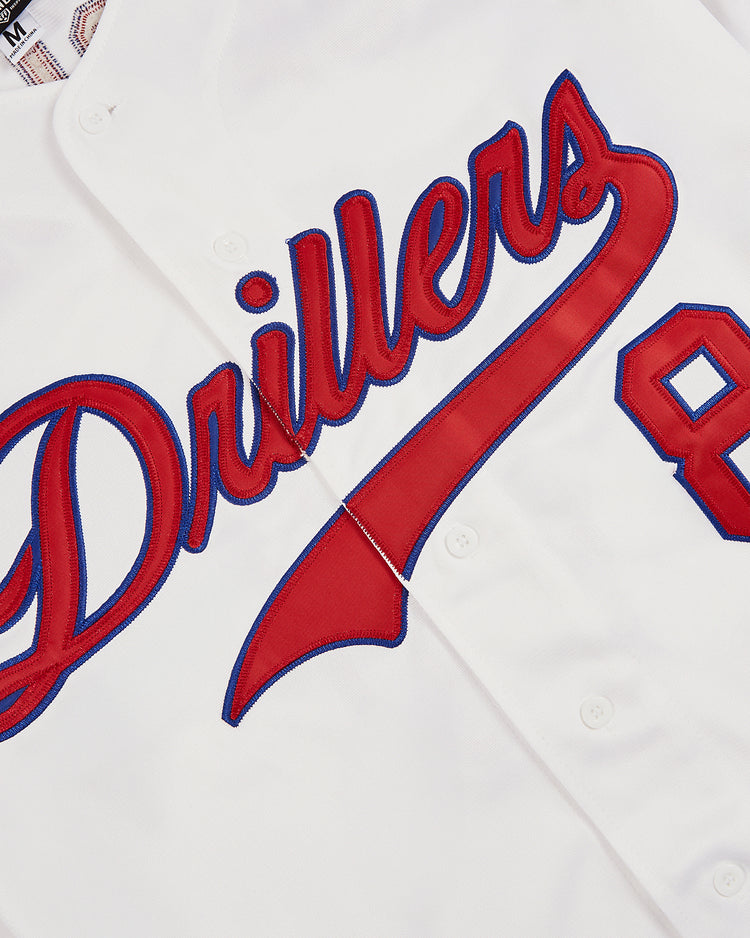 A close-up of the Ebbets Field Pudge Rodriguez Tulsa Drillers Button Up Jersey shows 
