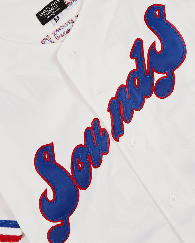 A close-up of the Trevor Hoffman Nashville Sounds Button Up Jersey by EFF, featuring blue and red trim, 