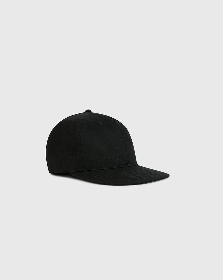 The Ebbets Field Black Cotton Twill Ballcap, featuring a curved brim and vintage style, is displayed against a light gray background.