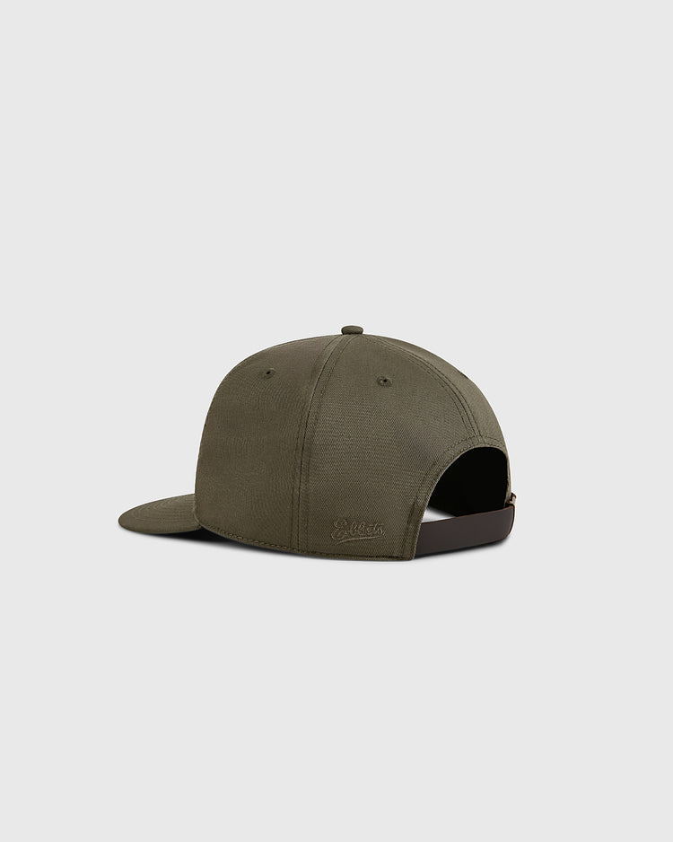 The Olive Green Cotton Twill Ballcap by Ebbets Field is shown from the back, featuring a black adjustable strap and subtle side embroidered logo, set against a plain light gray background.