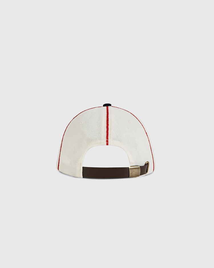 The Ebbets Field USA National Team 1936 Authentic Wool Ballcap, inspired by classic wool hats, features a central red stripe and an adjustable brown strap with metal buckle for vintage style seen from the back.