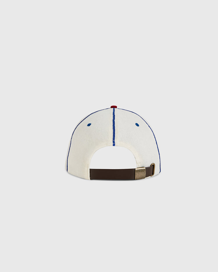 The Ebbets Field Oakland Oaks 1942 Authentic Wool Ballcap is shown from the back, featuring a blue vertical seam, red top button, and an adjustable brown strap with metal clasp, set against a plain light gray background.