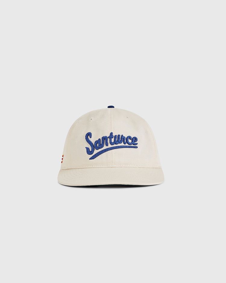 The Ebbets Field Santurce Cangrejeros 1939 Cotton Twill Ballcap features cream-colored fabric and blue 