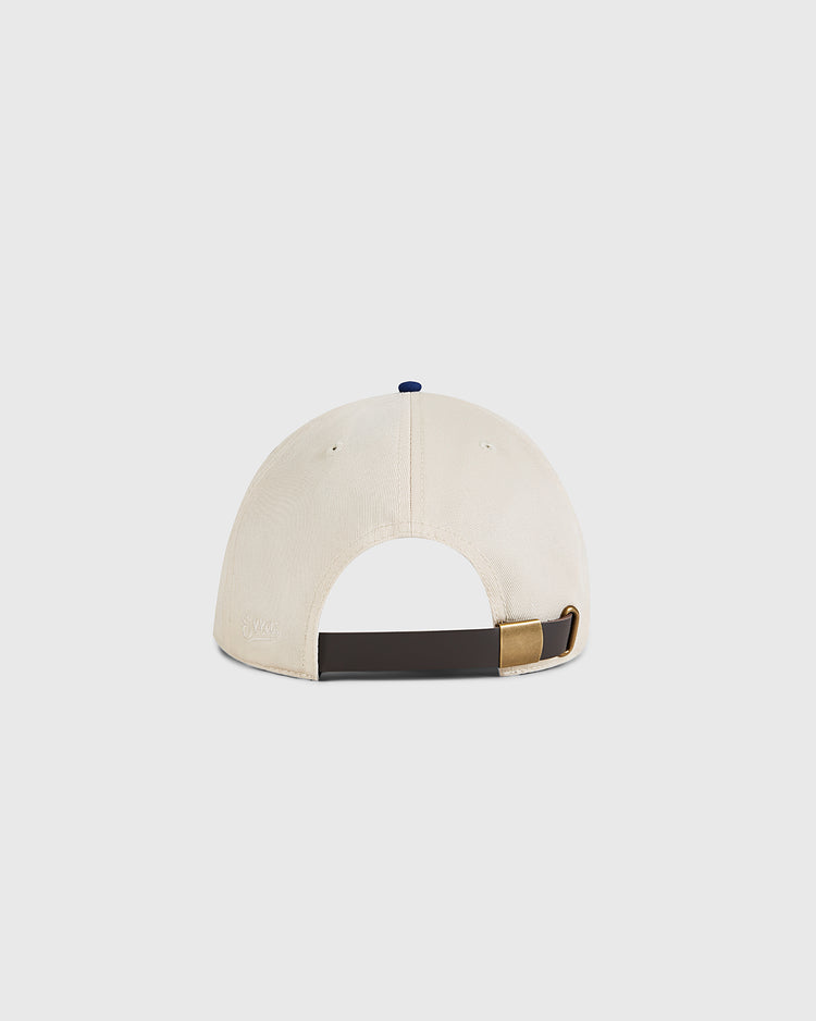 The Ebbets Field Santurce Cangrejeros 1939 Cotton Twill Ballcap, shown from the back, features a beige vintage look with an adjustable dark brown strap and gold clasp, set against a plain light gray background.