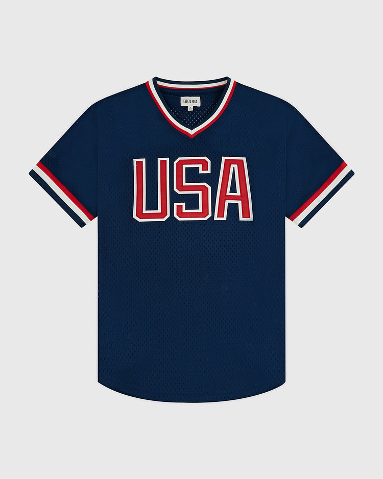 The Ebbets Field USA National Team Mesh V-Neck Jersey features navy blue mesh with white and red trim, inspired by the 1956 Olympics, and 