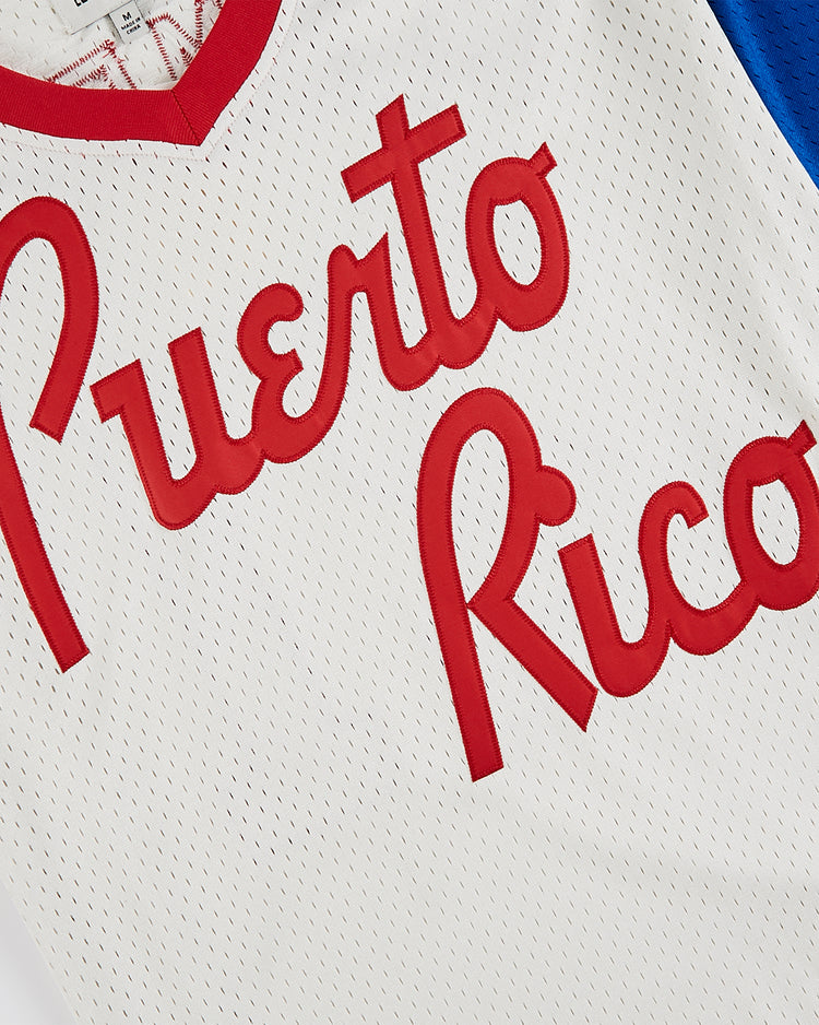 A close-up of the Ebbets Field Puerto Rico 1976 National Team Mesh V-Neck Jersey, featuring red 
