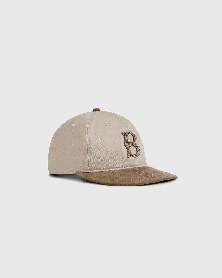 The Ebbets Field Brooklyn Royal Giants 1925 Cotton Twill Suede Ballcap features a beige crown, brown visor, and brown embroidered “B” on the front, shown on a plain light gray background.