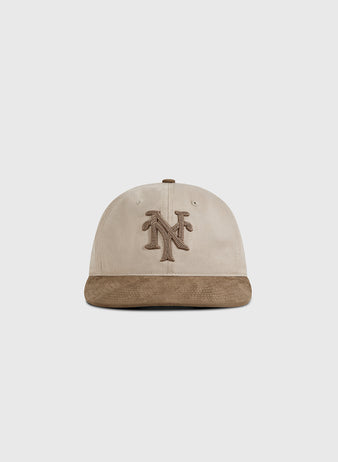 The Ebbets Field New York Cubans 1948 Cotton Twill Suede Ballcap features a beige crown, brown suede brim, and an embroidered NY logo, inspired by the classic 1948 ballcap and shown on a plain white background.