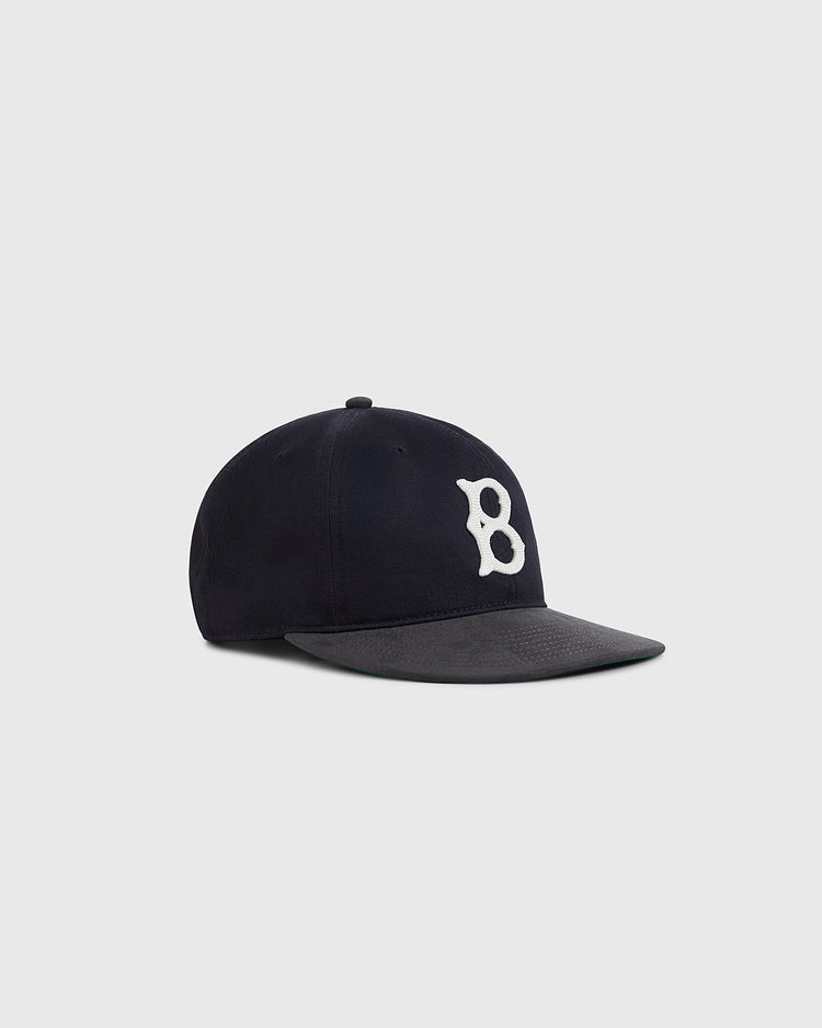 The Ebbets Field Brooklyn Royal Giants 1925 Cotton Twill Suede Ballcap features navy blue fabric and a white 